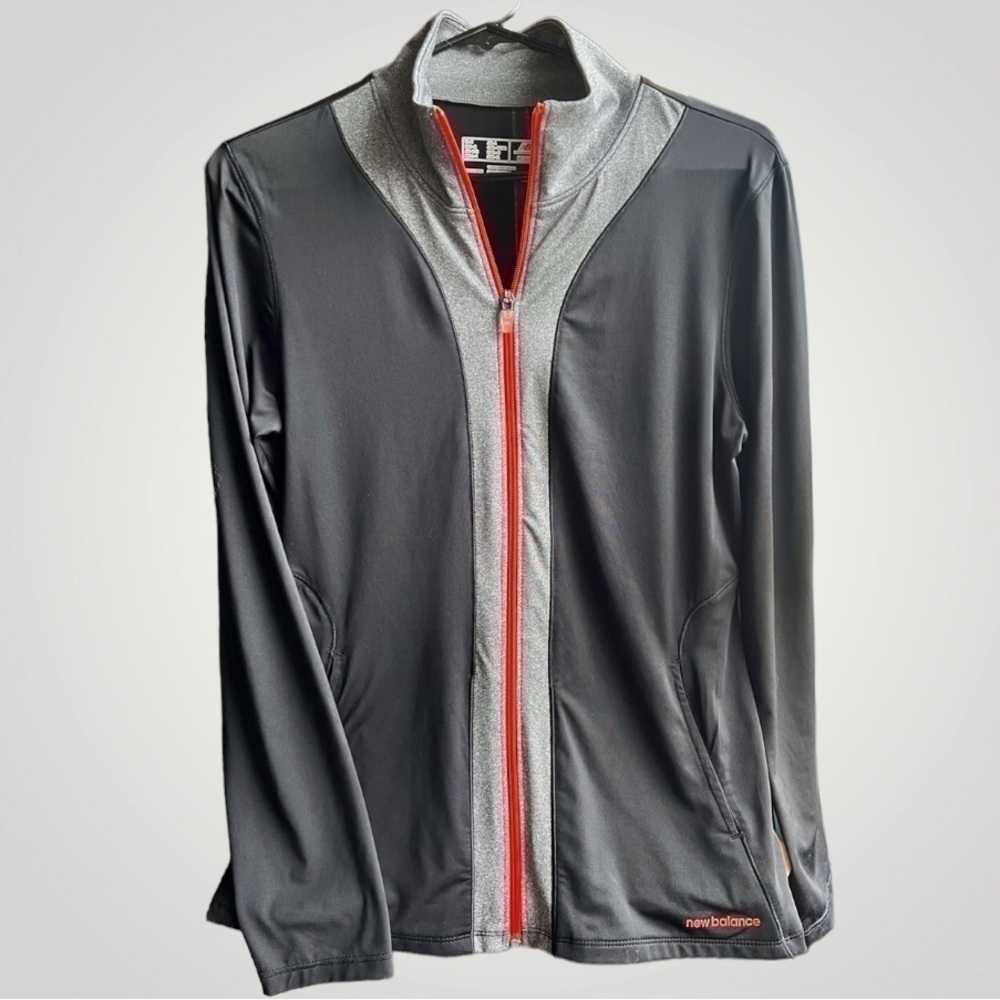 NEW Balance Women’s lightning dry, full zip top.